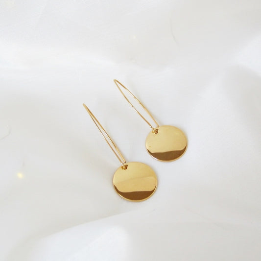 Almond and medal earrings